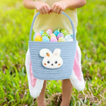 Poschnor blue cotton rope storage bin demonstrating the lightweight double handles for toddlers.