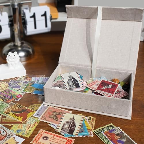 Stack of Hiwhy beige linen photo organizer boxes on a desk