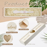 Wooden pregnancy reveal box open with test stick inside