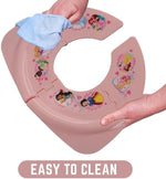 Toddler folding toilet seat being placed into its clear hygienic zip lock storage bag