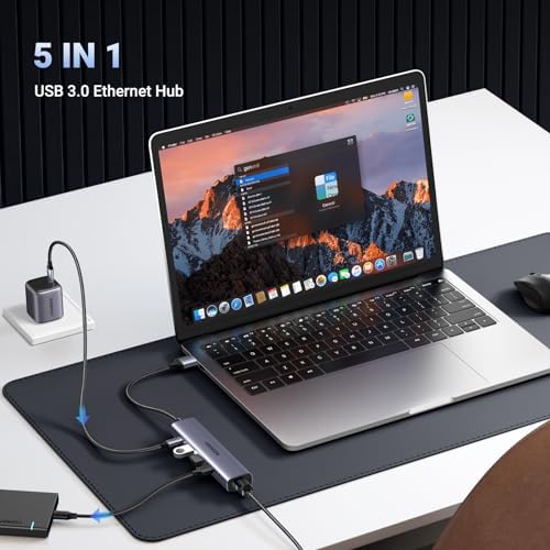 UGreen 5 in 1 multiport hub showcasing the three high speed USB 3.0 ports for peripheral accessory connections.