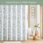 Close up of sage green botanical floral print on white cotton fabric