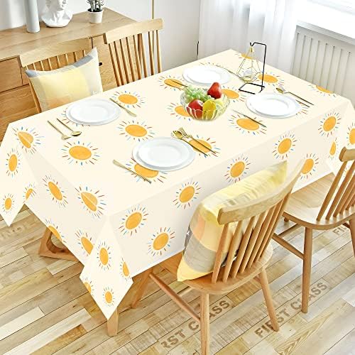 Here Comes the Son themed baby shower table setup using yellow boho tablecloths