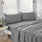 Elegant solid grey Kingnex 132x110 flat sheet folded carefully showing fabric thickness and quality