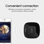 Esinkin media streaming adapter showcasing the small buttonless profile alongside a modern smartphone setup