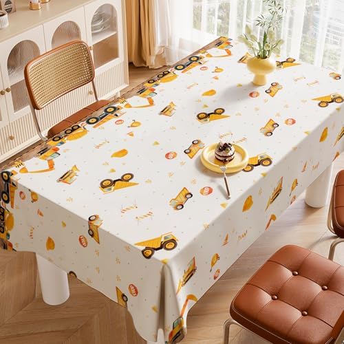 Close up look at the excavator and dump truck patterns printed on the side of the disposable children party tablecloth.