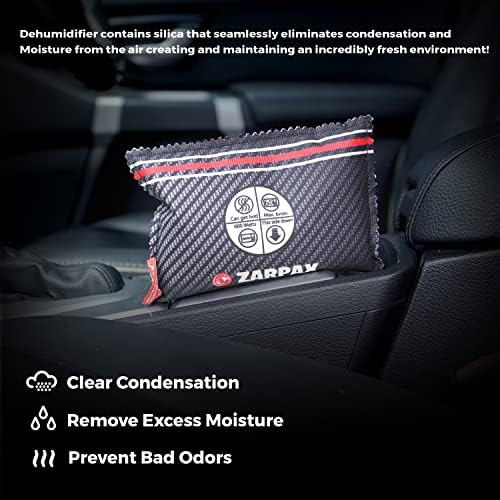 Pair of charcoal gray Zarpax dehumidifier bags on a car dashboard.