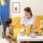 Assorted non-toxic paints and brush included in handprint set