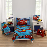 Disney Cars Radiator Springs blanket displayed on a toddler bed.