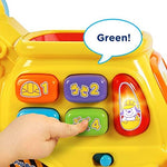 Interactive bulldozer toy showing the front scoop bucket containing the multicolored plastic balls