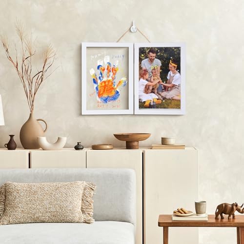 A completed multi generation family handprint art project displayed proudly on a living room tabletop.