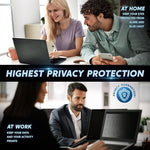 Professional working on MacBook Air with privacy filter in cafe