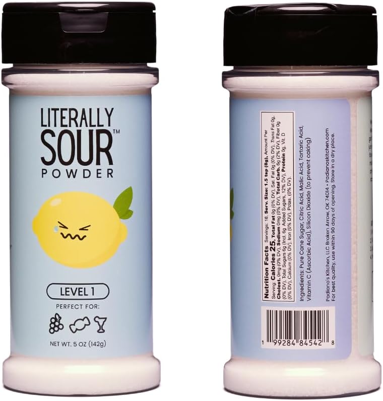 Close up of gluten free dye free sour seasoning powder being sprinkled on fresh fruits.