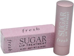 Fresh tinted lip balm swatch showing sheer pink blossom shade