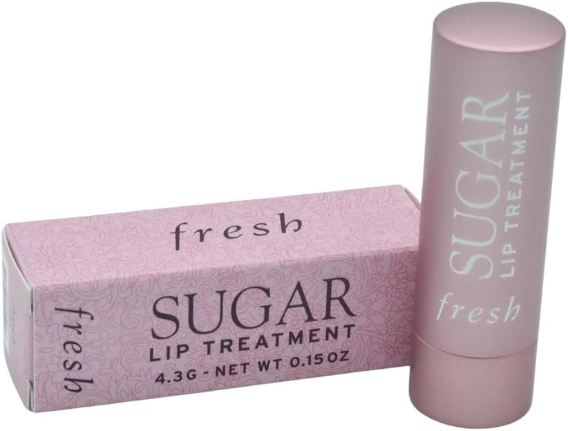 Fresh tinted lip balm swatch showing sheer pink blossom shade