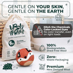Wooly Heroes reusable dryer balls reducing wrinkles in fresh laundry.
