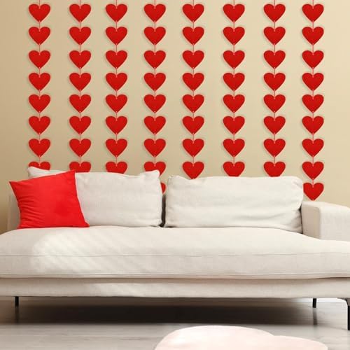 Childom heart shape hanging banner used as a backdrop for a bridal shower party celebration.