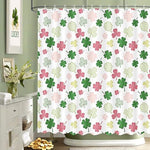 Close-up detail of the waterproof polyester fabric on the MEHOFOND Irish clover bathroom curtain showing water resistance.