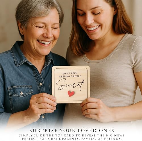 First time grandparents gift package opening to reveal the wooden sonogram photo frame inside.