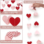 Rose gold pink and burgundy red paper heart banner close up