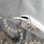 Matching paisley printed pillow shams included in the Nanko three piece queen size set