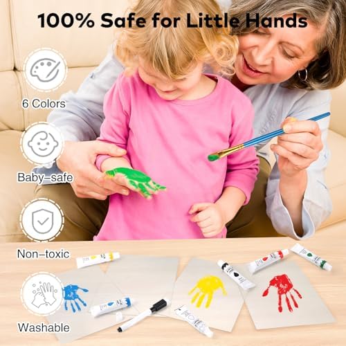 Family members layering multi color handprints using the Omrhvi safe paint set.