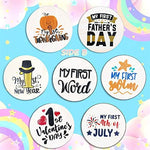 Seven pack of baby milestone wooden signs with organza gift bag