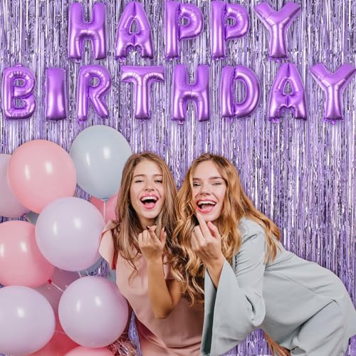 Graduation party stage setting using light purple metallic streamer backdrops