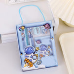 Imported space theme creative stationery set blue front view showcasing notebooks and pencils.