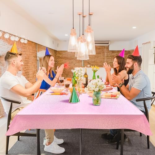 Two pack of pale pink disposable rectangular table covers for parties
