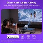 Aurzen portable outdoor projector setup in a bedroom night environment