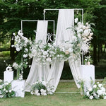 Wokceer twenty feet long white draping fabric styled with artificial flowers