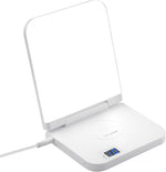 Micro ENE Light Therapy Lamp front view with illuminated flat panel showing bright white light on a desk