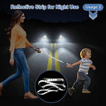Parent and child using the wrist link tether for walking