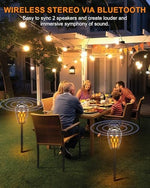MOFOKEAY wireless lantern speakers two pack displayed on an outdoor patio table