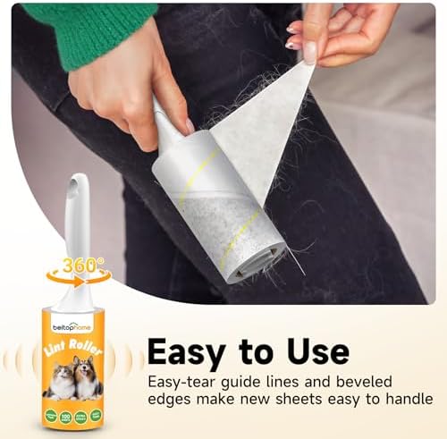 Pet hair removal from a black sofa using a sticky lint roller