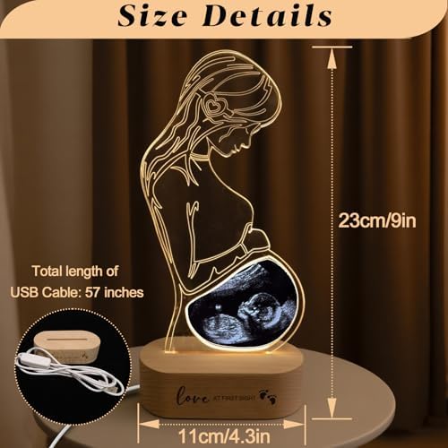 Customized acrylic ultrasound night light with a glowing expectant mother silhouette