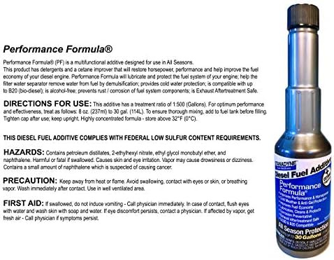 Four eight ounce bottles of Stanadyne 38564 all season fuel treatment showing packaging details