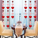 Folded reusable Auihiay felt heart garlands demonstrating easy storage after a party celebration