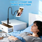 Hands-free flexible tablet mount twisted into a stable Z shape on a wooden nightstand