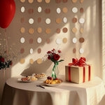 Close up view of the high quality craft paper dots on the WEVEN neutral garland strand