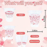 Close up of red and pink heart pattern on disposable party cups