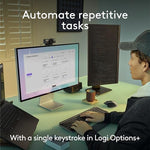 Logitech smart backlit keyboard operating in low light conditions showing automatic proximity illumination feature.
