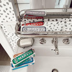 Marvis luxurious Italian oral care product line display with white whitening mint tube
