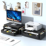 Three quarter angle of Spacrea monitor stand showing the spacious under shelf document storage tray.