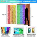 Metallic rainbow tinsel background curtain streamer panels installed on a white wall