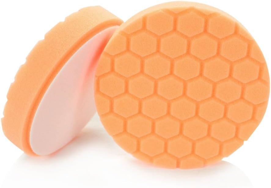 Chemical Guys Orange Hex-Logic Medium-Heavy Cutting Pad front view showing laser-cut hexagonal texture surface.