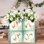 Sage green flower boxes for baby shower table display
