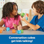 Close up view of the green emotional and feelings prompts on the soft foam speech therapy cubes.