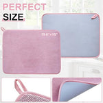 Hlavite microfiber dishes drainer pad flipped over to reveal the light blue non-slip backing material.
